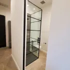 Business 18 image METAL WOOD GLASS INNOVATIONS Cabinet Glass Installation in Houston TX