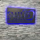 Business 1 image SMILES BY DESIGN Implant Supported Denture in Flower Mound TX
